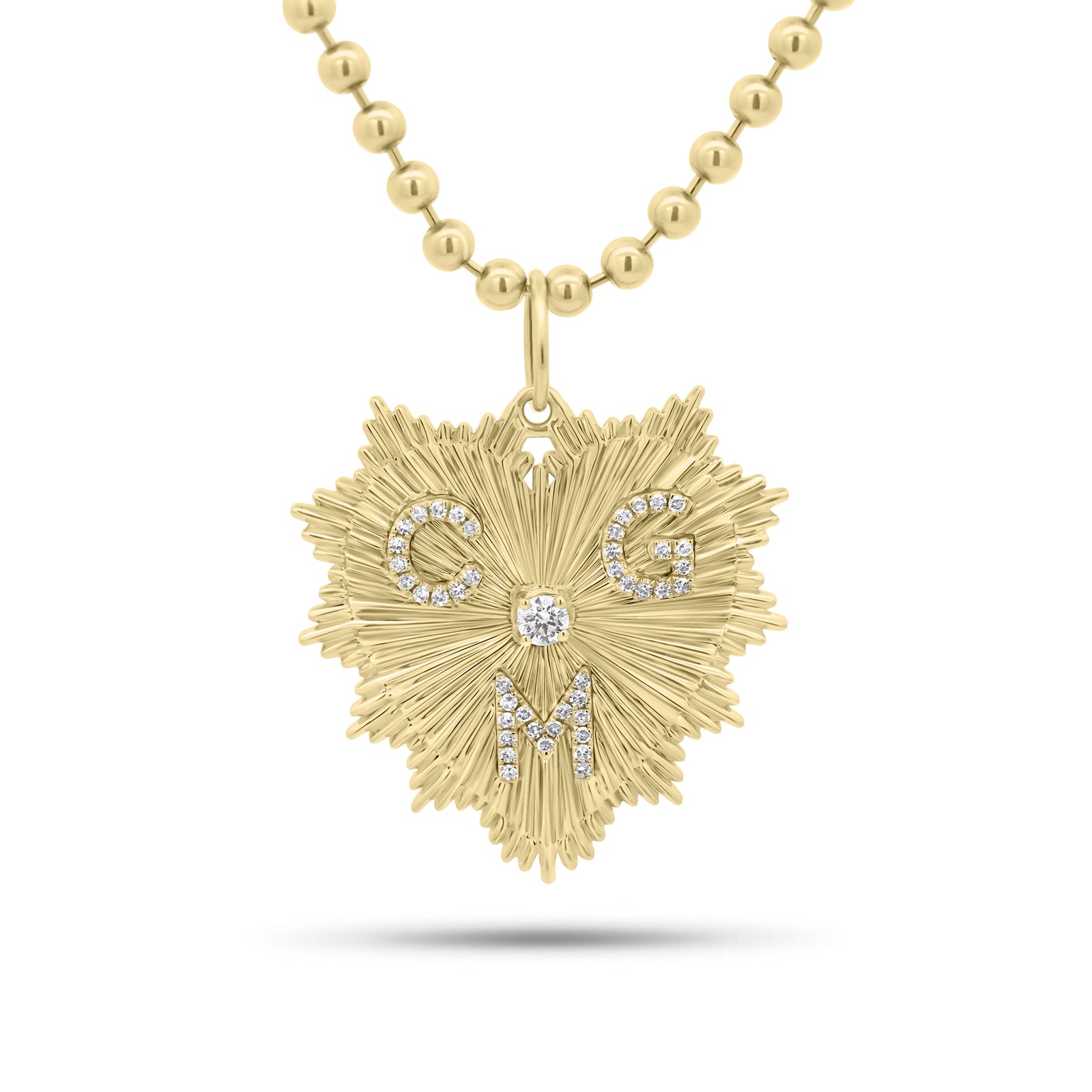 Fluted Gold Heart Pendant with Diamond Initials - 14K gold weighing 4.12 grams
- 44 round diamonds weighing 0.19 carats