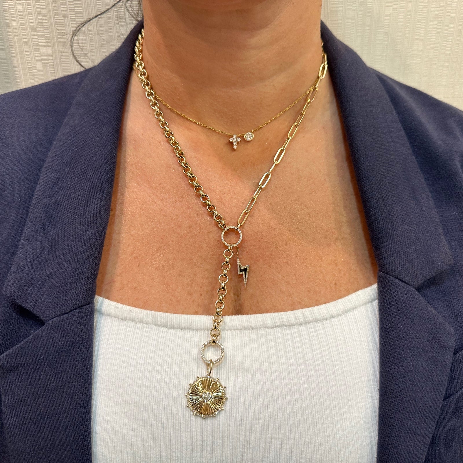 Diamond Heart Ridged Gold Disc Pendant - 14K gold weighing 2.78 grams - 58 round diamonds weighing 0.15 carats  - 0.25 ct heart-shaped diamond