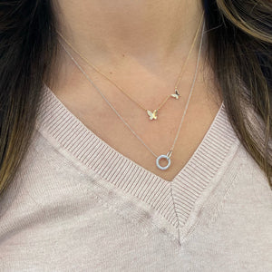 Female Model Wearing Diamond Circle & Link Pendant Necklace - 14K gold weighing 2.24 grams - 58 round diamonds weighing 0.13 carats