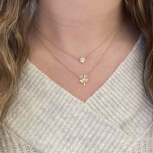 Female Model Wearing Diamond Four-Leaf Clover Pendant Necklace - 14K gold weighing 2.0 grams - 85 round diamonds weighing 0.14 carats
