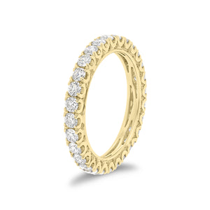 Four Prong-Set Diamond Eternity Wedding Band -18k yellow gold weighing 2.63 grams -84 round diamonds weighing 1.36 carats