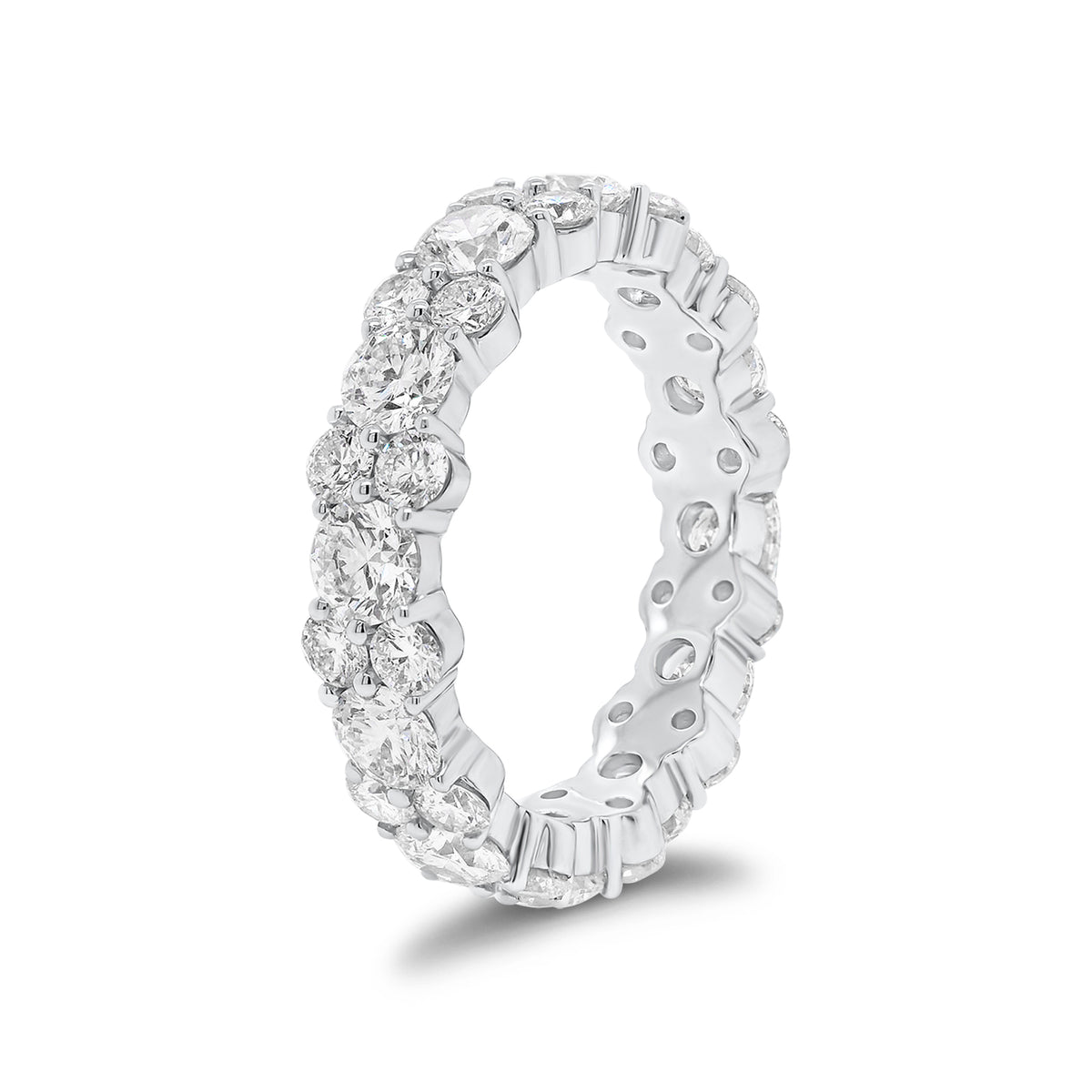 Staggered Diamond Eternity Band -18k white gold weighing 4.14 grams -12 round diamonds weighing 2.40 carats -24 round diamonds weighing 1.38 carats