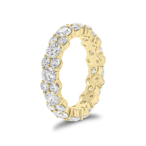 Staggered Diamond Eternity Band -18k yellow gold weighing 4.14 grams -12 round diamonds weighing 2.40 carats -24 round diamonds weighing 1.38 carats
