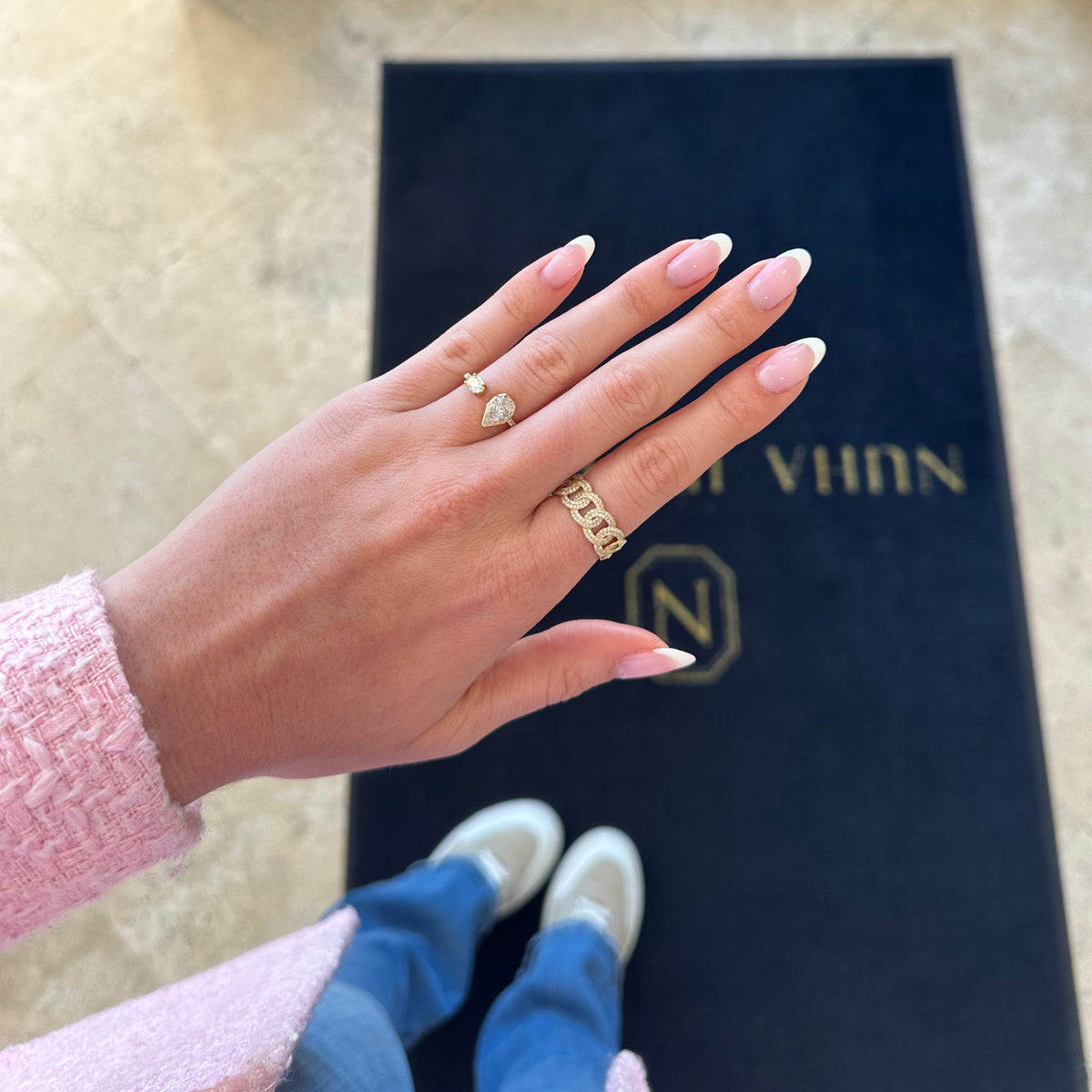 Female Model Wearing Diamond Circle Links Ring - 14K gold weighing 5.35 grams - 190 round diamonds weighing 0.50 carats