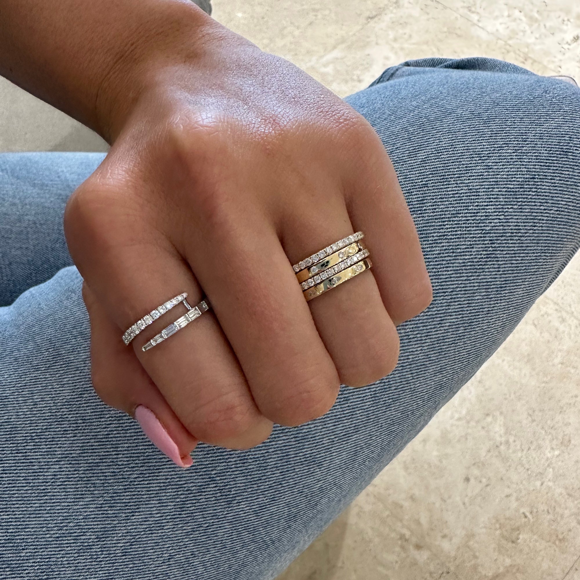 Baguette & Round Diamond Wrap Ring - 14K gold weighing 1.96 grams  - 12 round diamonds weighing 0.22 carats  - 12 straight baguettes weighing 0.28 carats