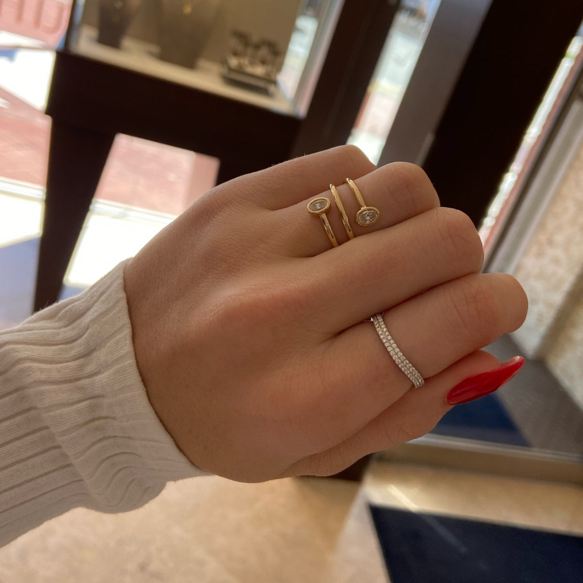 Female Model Wearing Diamond Wave Stackable Ring - 14K gold weighing 1.82 grams - 74 round diamonds weighing 0.36 carats