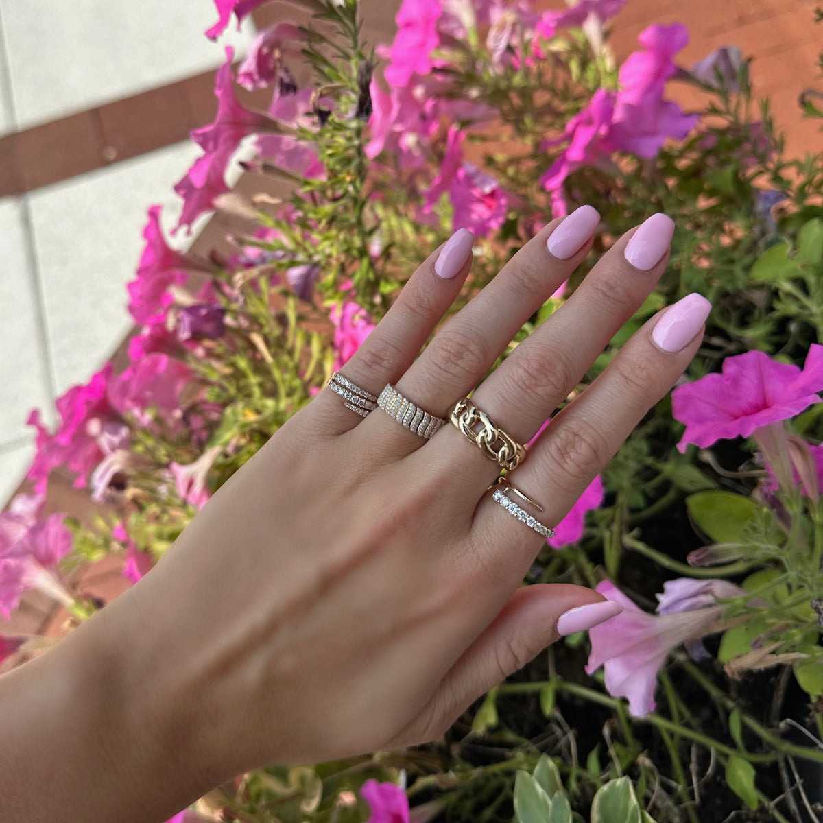 Female Model Wearing Diamond Open Double Wrap Ring - 14K gold weighing 3.36 grams - 29 round diamonds totaling 0.85 carats