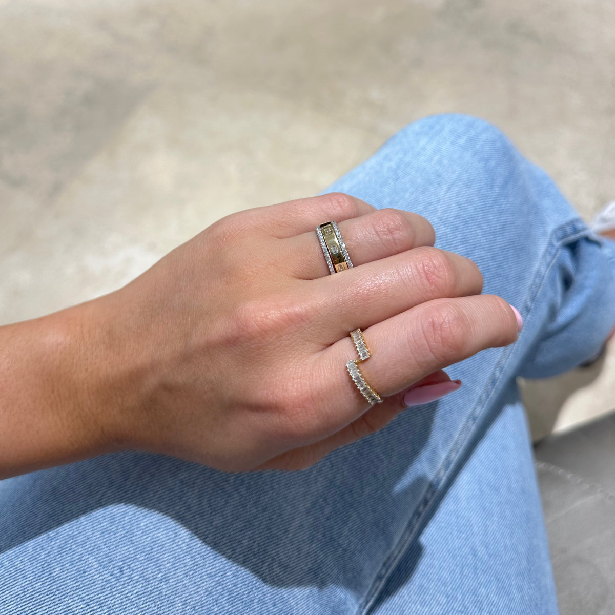 Female model wearing Emerald Cut Diamond Stackable Ring - 14K gold weighing 4.29 grams - 10 emerald-cut diamonds weighing 0.86 carats