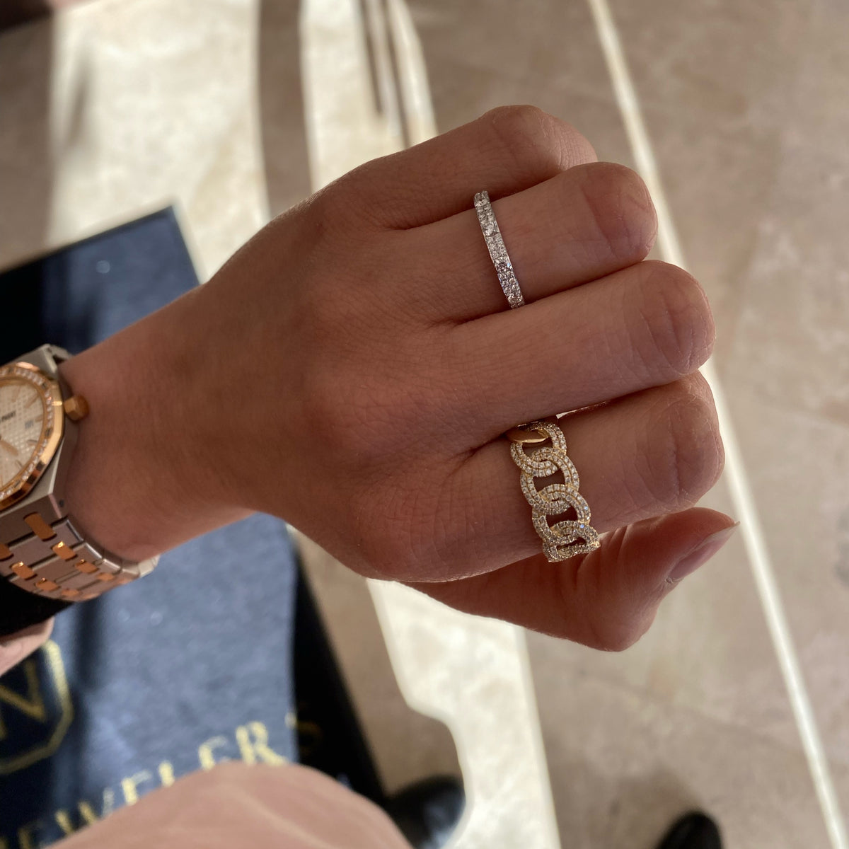 Female Model Wearing Diamond Pattern Stacking Ring - 14K gold weighing 1.78 grams - 36 round diamonds weighing 0.17 carats - 5 round diamonds weighing 0.20 carats