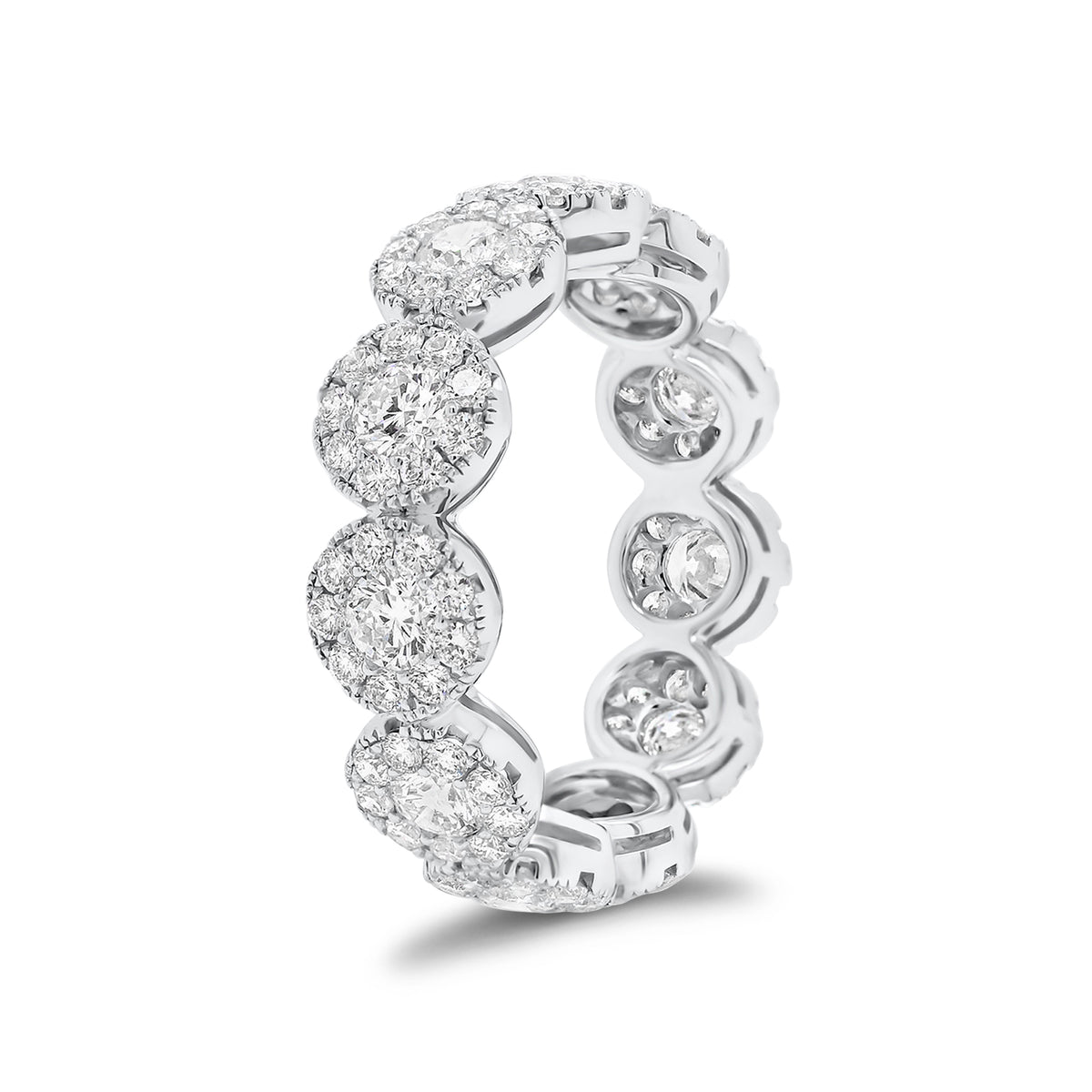 Diamond halo eternity ring -18K gold weighing 3.96 grams  -11 round diamonds totaling 1.18 carats  -99 round pave-set diamonds totaling 1.06 carats