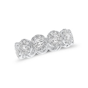 Diamond halo eternity ring -18K gold weighing 3.96 grams  -11 round diamonds totaling 1.18 carats  -99 round pave-set diamonds totaling 1.06 carats