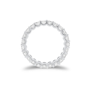 3.55 ct Radiant-Cut Diamond Eternity Band - 18K gold weighing 3.89 grams  - 23 radiant-cut diamonds weighing 3.55 carats (GIA-graded F-color, VS clarity)