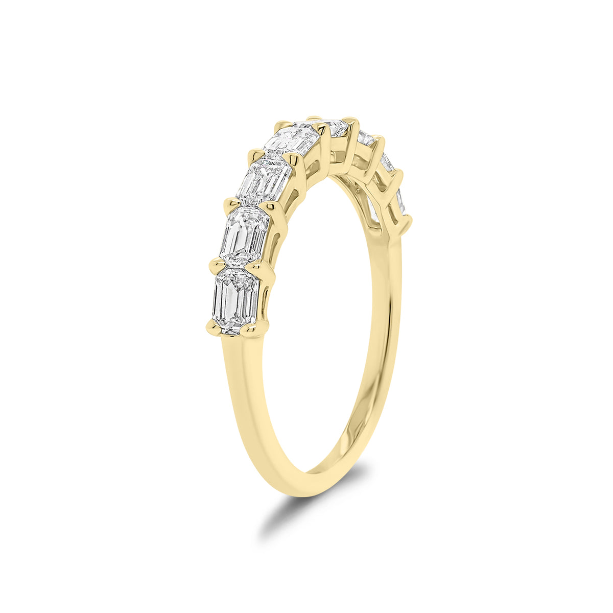 East to West Emerald-Cut Diamond Wedding Band - 18K yellow gold weighing 2.21 grams - 8 emerald-cut diamonds weighing 1.09 carats
