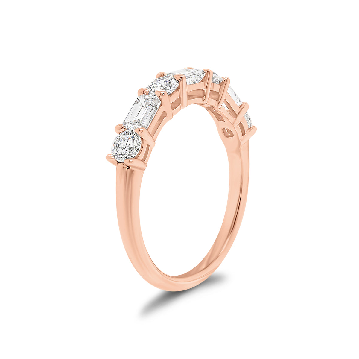 Round & Emerald-Cut Diamond Wedding Band - 18K rose gold weighing 2.56 grams - 3 emerald-cut diamonds weighing 0.60 carats - 4 round diamonds weighing 0.52 carats