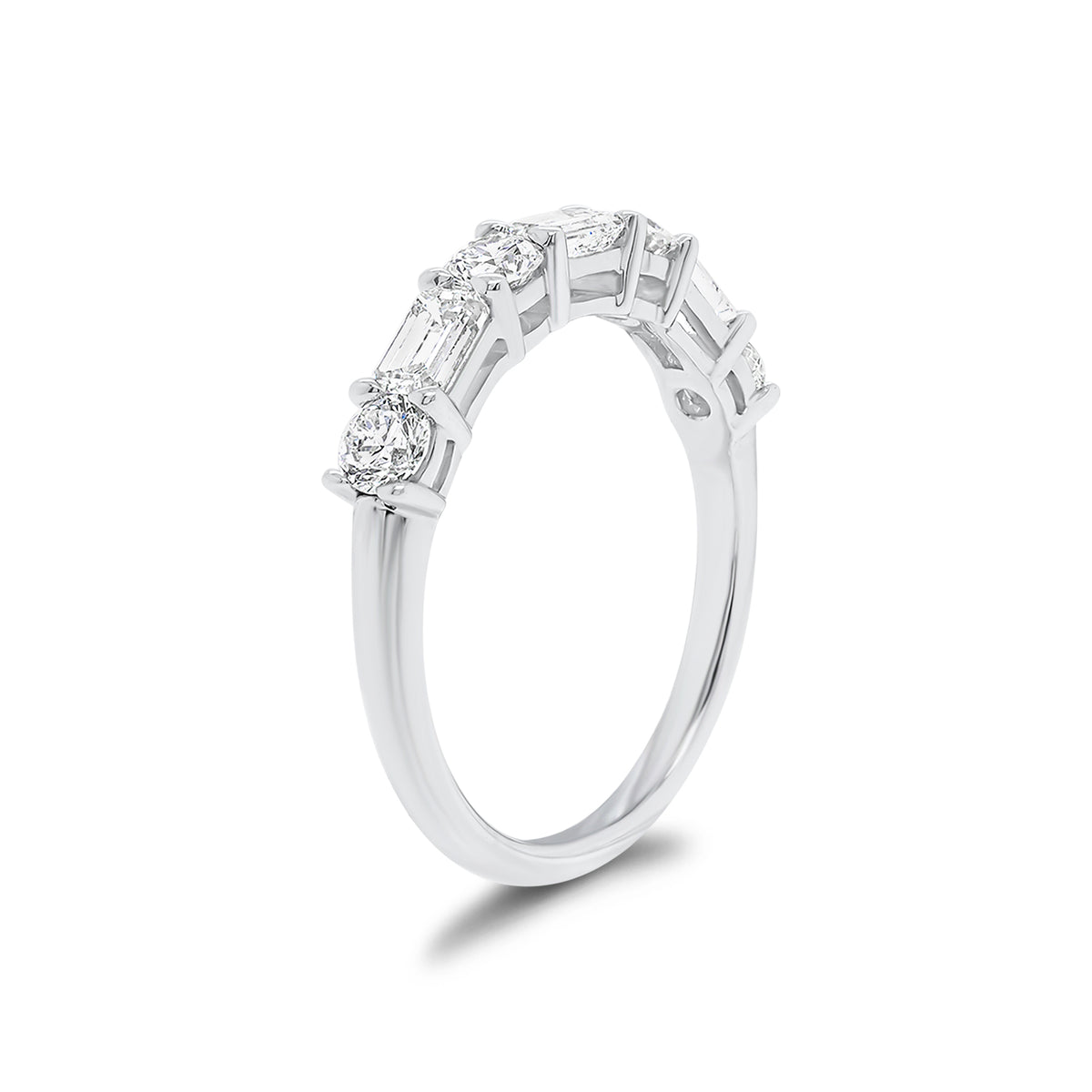 Round & Emerald-Cut Diamond Wedding Band - 18K white gold weighing 2.56 grams - 3 emerald-cut diamonds weighing 0.60 carats - 4 round diamonds weighing 0.52 carats