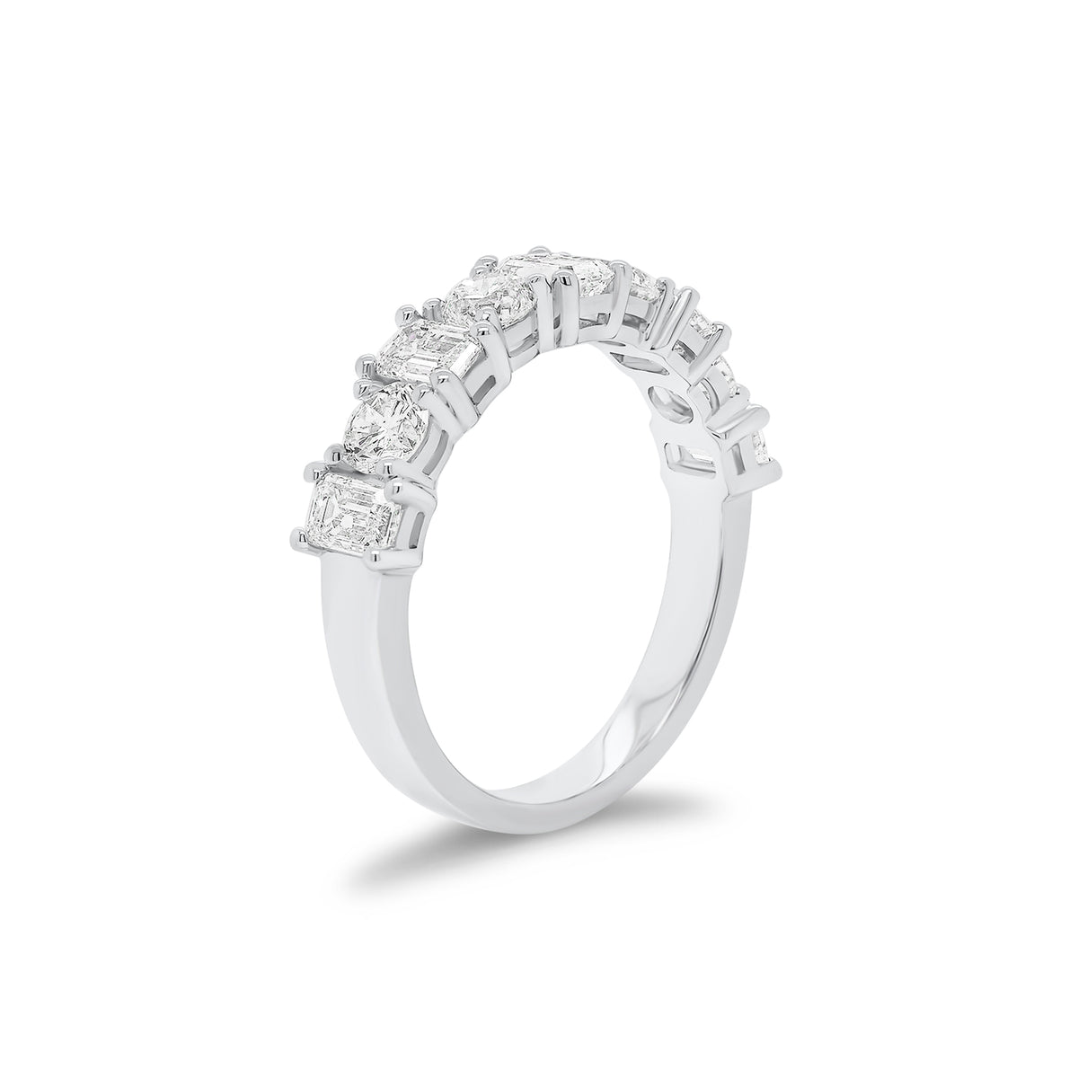 Emerald-Cut & Round Diamond Wedding Band - 18K gold weighing 3.53 grams - 4 round diamonds weighing 0.74 carats - 5 emerald-cut diamonds weighing 0.97 carats