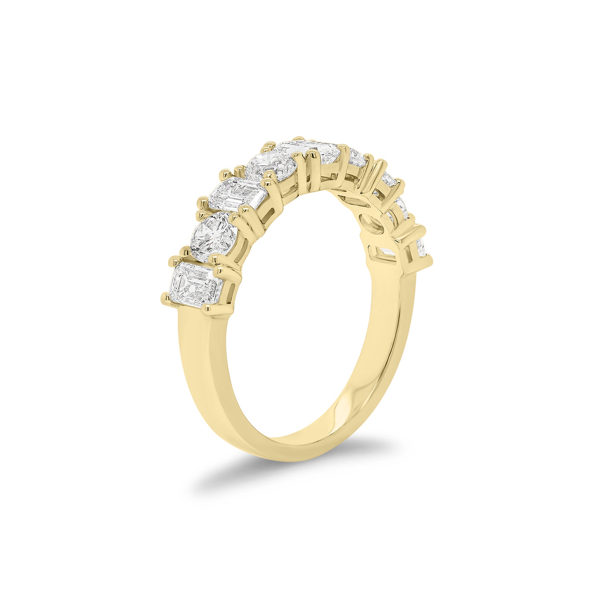 Emerald-Cut & Round Diamond Wedding Band - 18K gold weighing 3.53 grams - 4 round diamonds weighing 0.74 carats - 5 emerald-cut diamonds weighing 0.97 carats