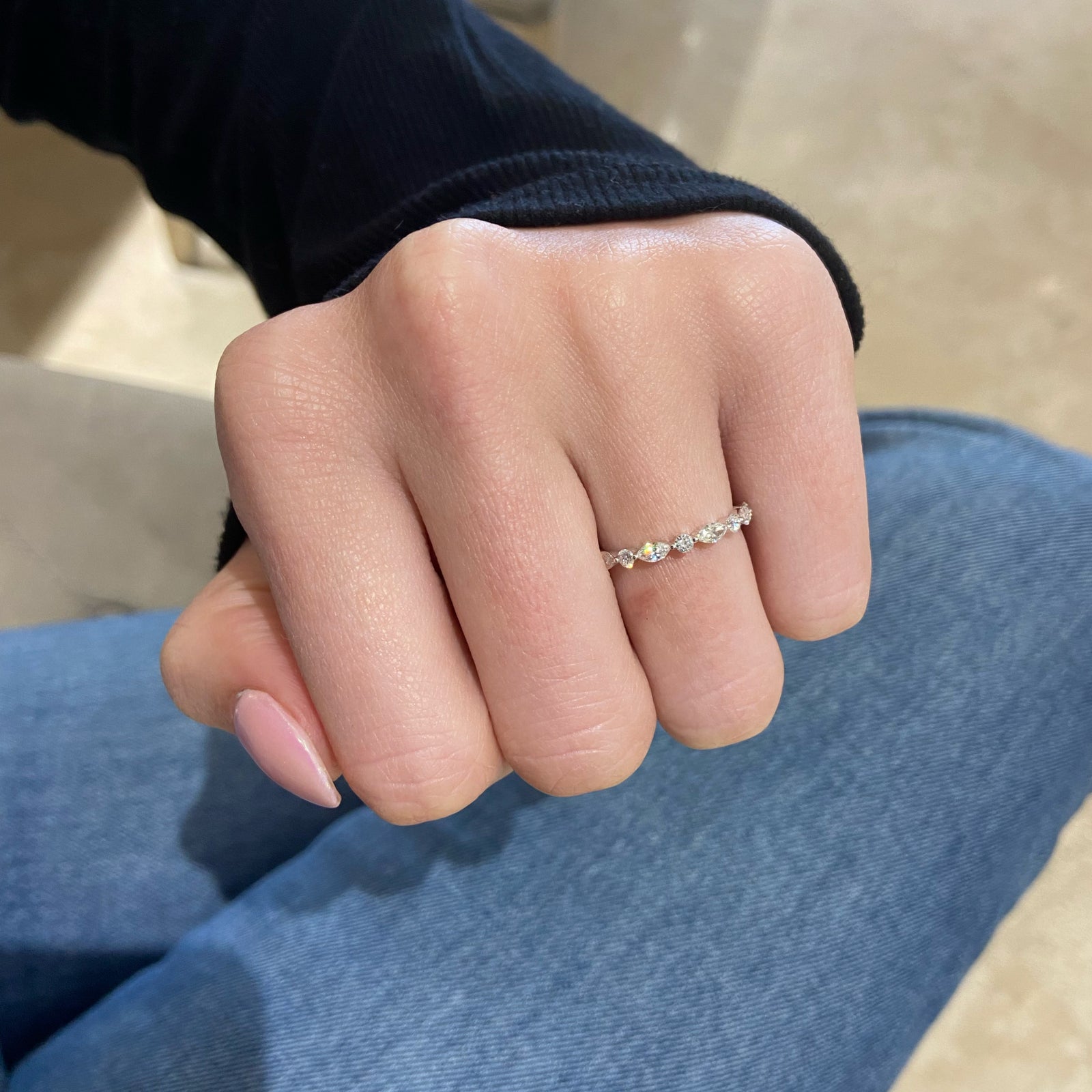 Marquise-Shaped & Round Diamond Wedding Band - 18K gold weighing 1.51 grams  - 5 round diamonds weighing 0.18 carats  - 4 marquise-shaped diamonds weighing 0.31 carats