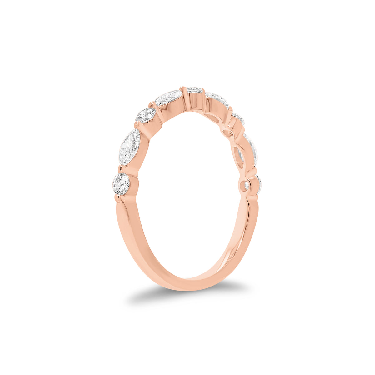 Marquise-Shaped & Round Diamond Wedding Band - 18K gold weighing 1.51 grams - 5 round diamonds weighing 0.18 carats - 4 marquise-shaped diamonds weighing 0.31 carats