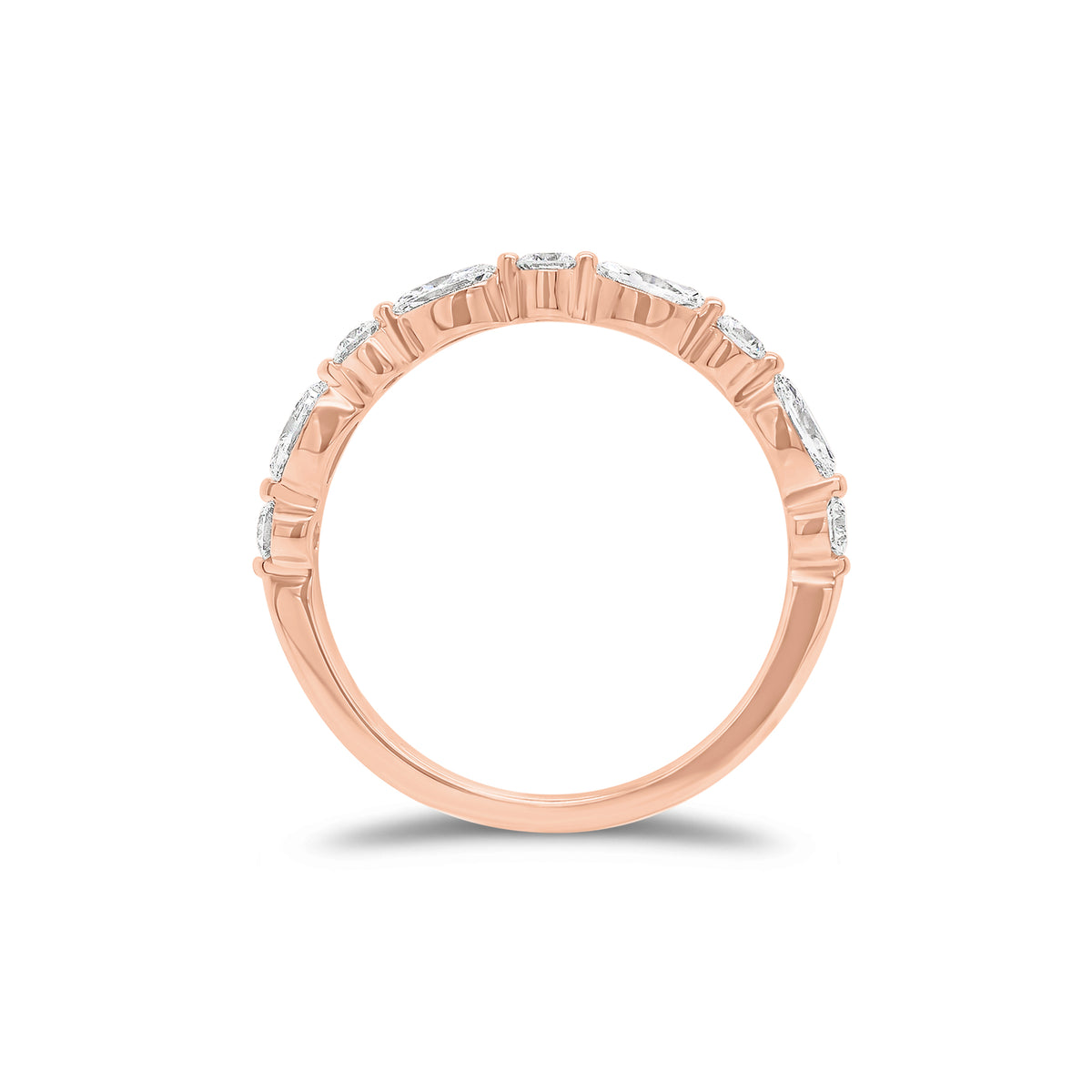Marquise-Shaped & Round Diamond Wedding Band - 18K gold weighing 1.51 grams - 5 round diamonds weighing 0.18 carats - 4 marquise-shaped diamonds weighing 0.31 carats