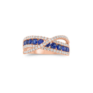Sapphire & diamond crossover ring - 18K gold weighing 5.45 grams  - 69 round diamonds weighing 0.50 carats  - 11 sapphires weighing 0.84 carats