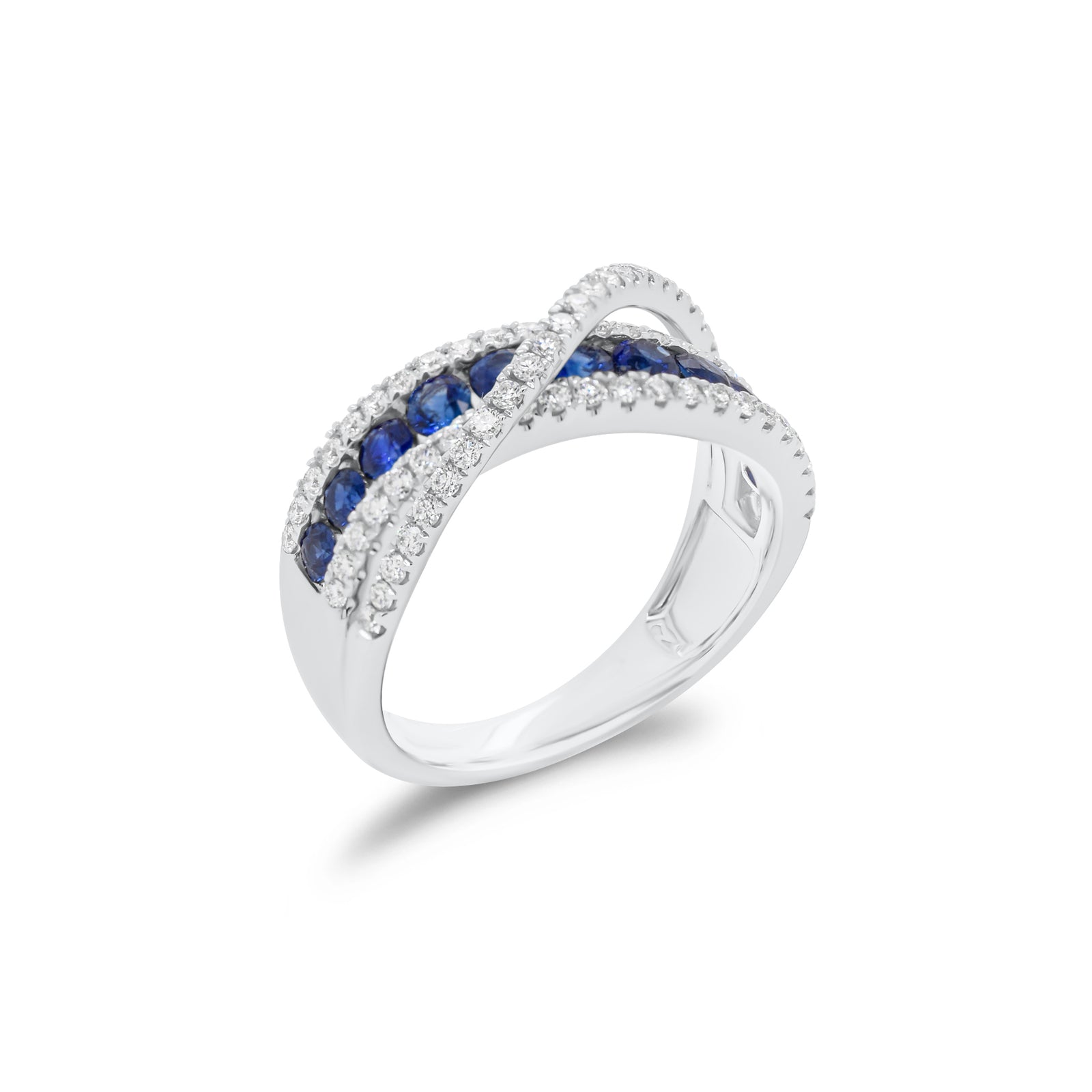 Sapphire & diamond crossover ring - 18K gold weighing 5.45 grams  - 69 round diamonds weighing 0.50 carats  - 11 sapphires weighing 0.84 carats