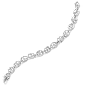 Diamond Tri-Link Bracelet -18K gold weighing 13.15 grams -355 round diamonds totaling 3.83 carats.