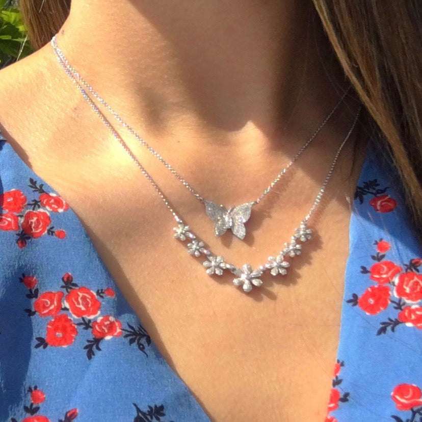 Single Cut Butterfly Necklace  -14K gold weighing 2.74 grams  -164 round pave set diamonds weighing 0.36 carats