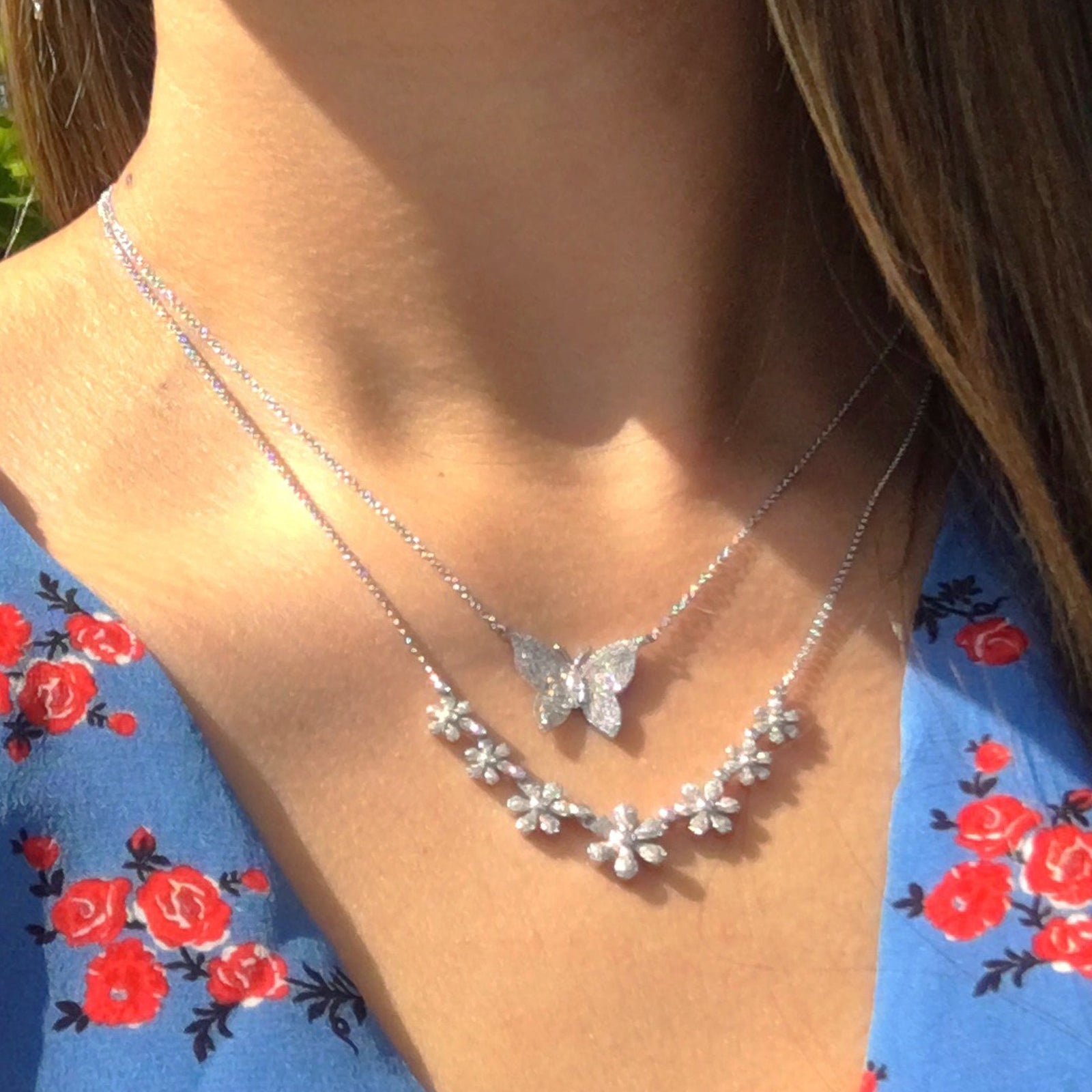 Diamond Daisy Chain Necklace  -14K gold weighing 5.39 grams  -15 round diamonds totaling 0.14 ct  -192 round pave-set diamonds totaling 0.48 carats