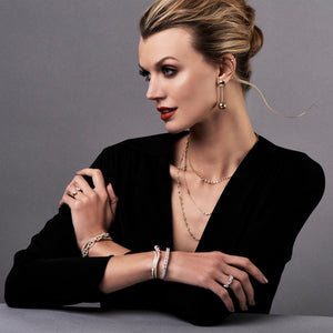 Female model wearing Diamond Chain with Antique Milgrain - 18k gold, 7.22 grams, 48 round bezel-set diamonds 2.03 carats