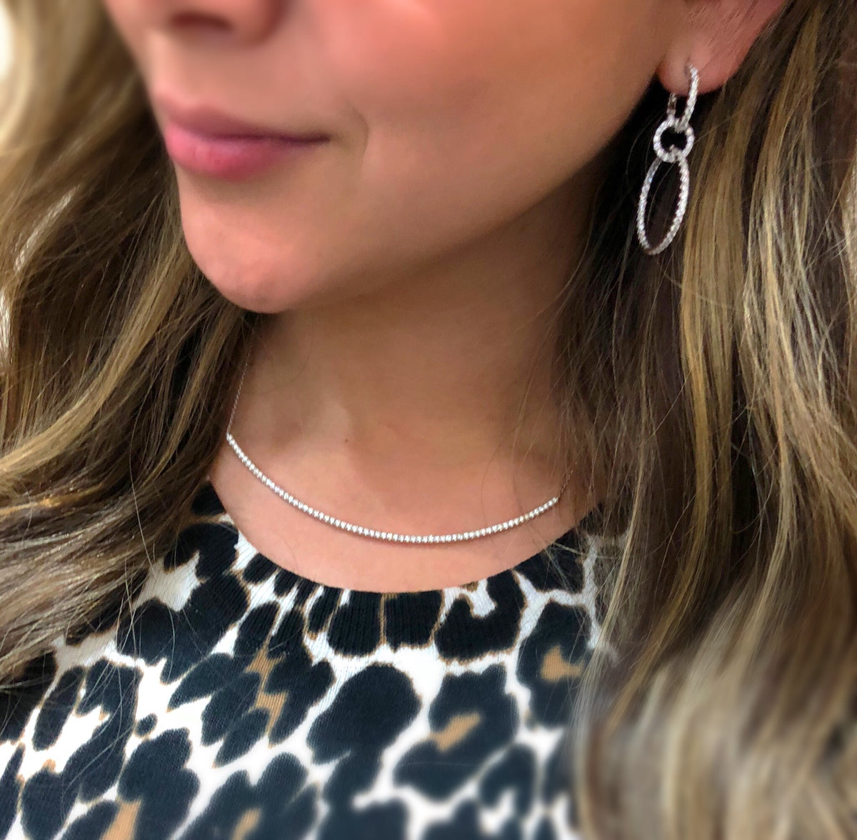 Female model wearing 4" Diamond Bar Necklace -14K gold weighing 5.0 grams -65 round diamonds totaling 1.11 carats