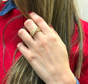 Female Model Wearing Diamond Twist Ring  18k gold, 4.21 grams, 56 round prong set diamonds .85 carats.