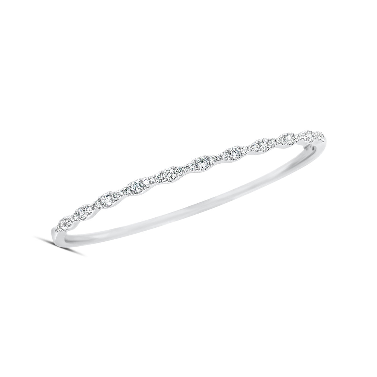 Diamond Ripple Bangle  - 14K gold weighting 10.21 grams.  - 45 round stones totaling 0.83 carats.