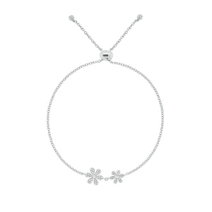 Diamond Adjustable Flower Bracelet -14K white gold weighing 2.31 grams -52 round diamonds totaling 0.19 carats -Adjustable bead closure