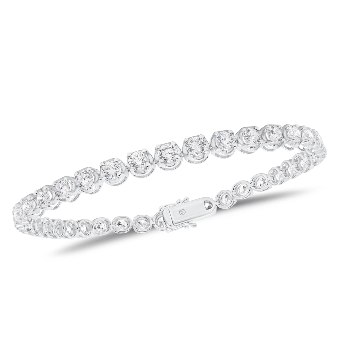 Diamond Large Tennis Bracelet -18K white gold weighing 10.40 grams -37 round prong-set diamonds totaling 6.28 carats