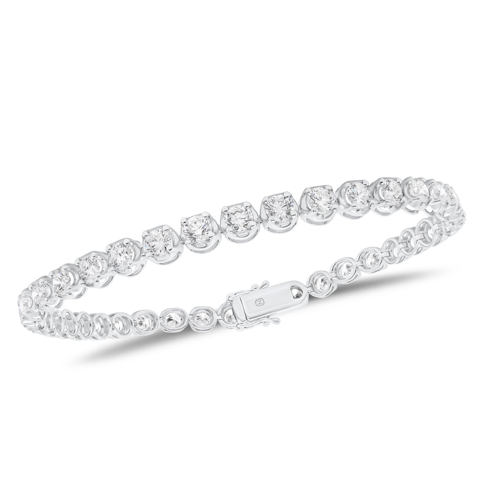 Diamond Large Tennis Bracelet -18K white gold weighing 10.40 grams -37 round prong-set diamonds totaling 6.28 carats