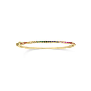 Rainbow Gemstone Bangle  - 14K gold weighting 6.78 grams.  - 86 Multicolor stones totaling 1.31 carats.