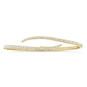 Diamond Slim Bypass Bracelet - 14 kt yellow gold weighing 6.73 grams - 66 round diamonds totaling 0.98 carats