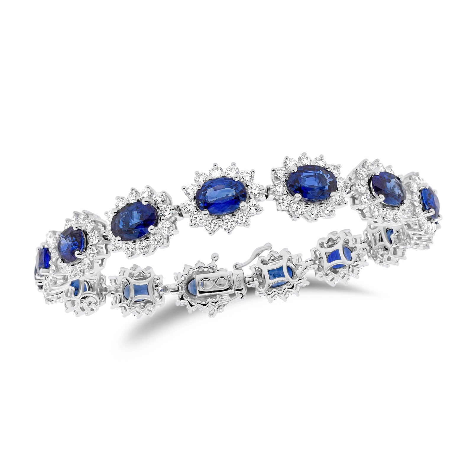 Sapphire & Diamond Wreath Bracelet  - 18K gold weighing 20.37 grams  - 180 round diamonds totaling 5.29 carats  - 15 sapphires totaling 13.14 carat