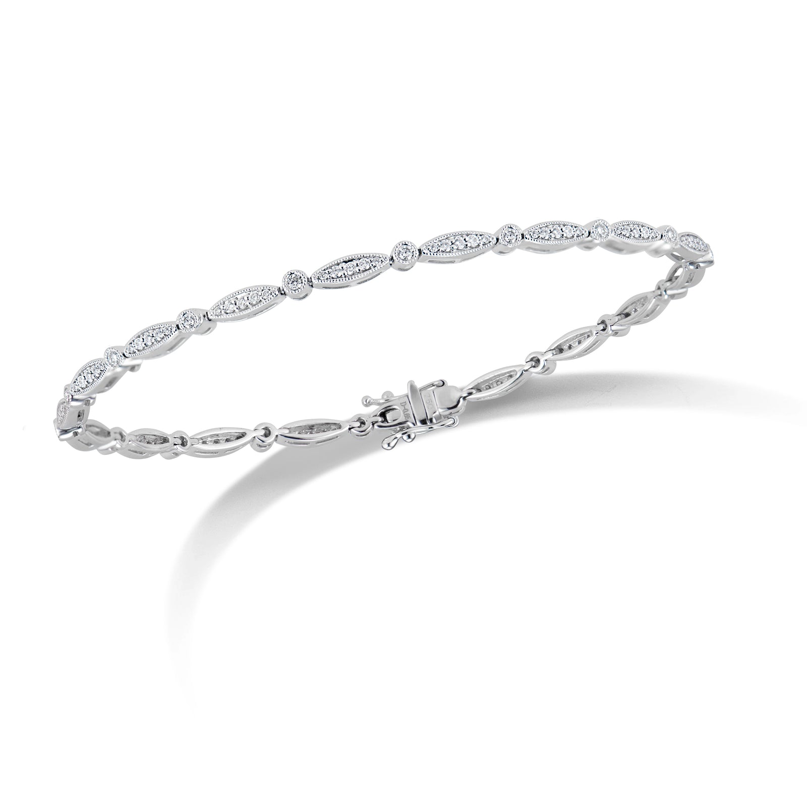 Diamond Marquises & Circles Tennis Bracelet  - 18K gold weighing 8.44 grams  - 108 round diamonds totaling 0.65 carats