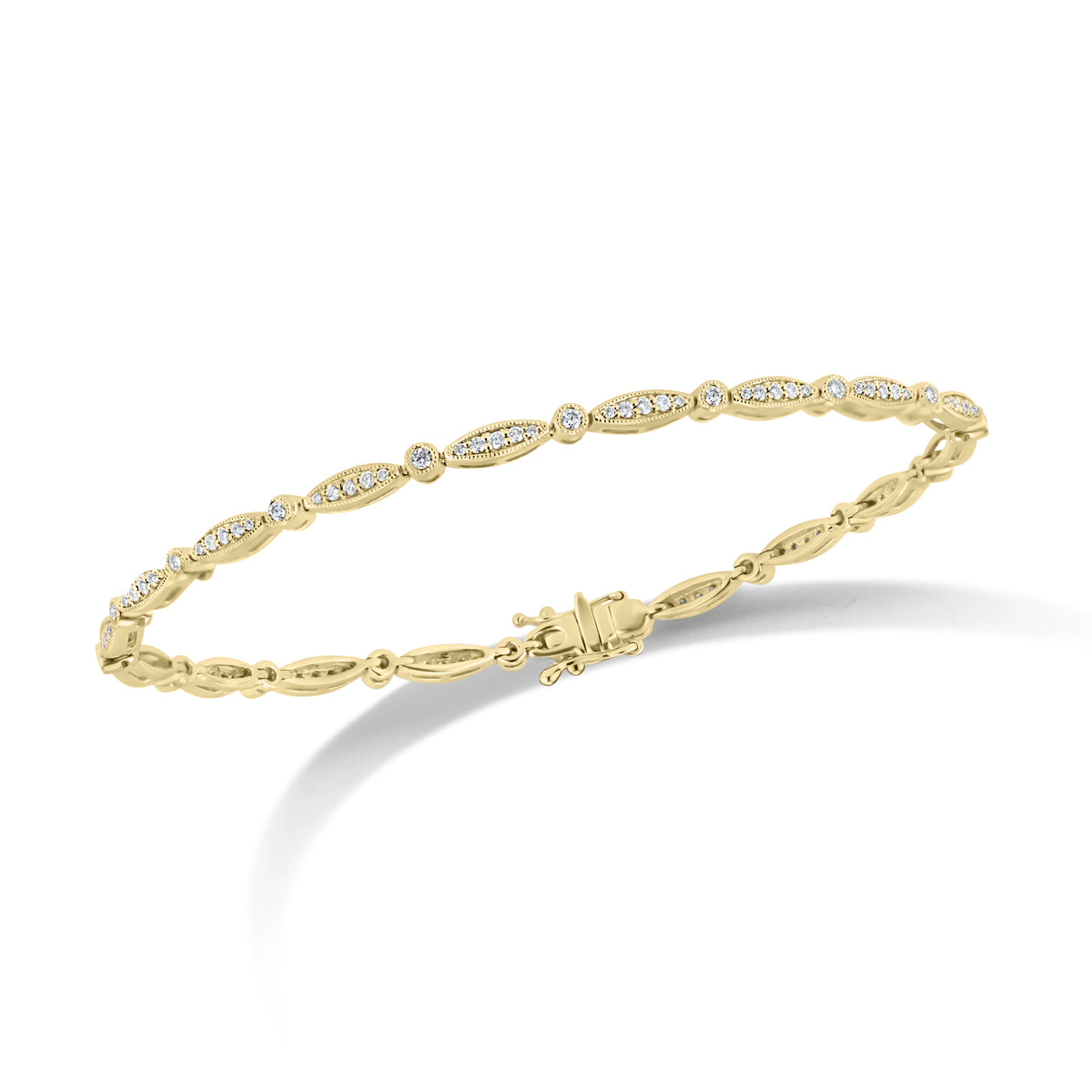 Diamond Marquises & Circles Tennis Bracelet  - 18K gold weighing 8.44 grams  - 108 round diamonds totaling 0.65 carats