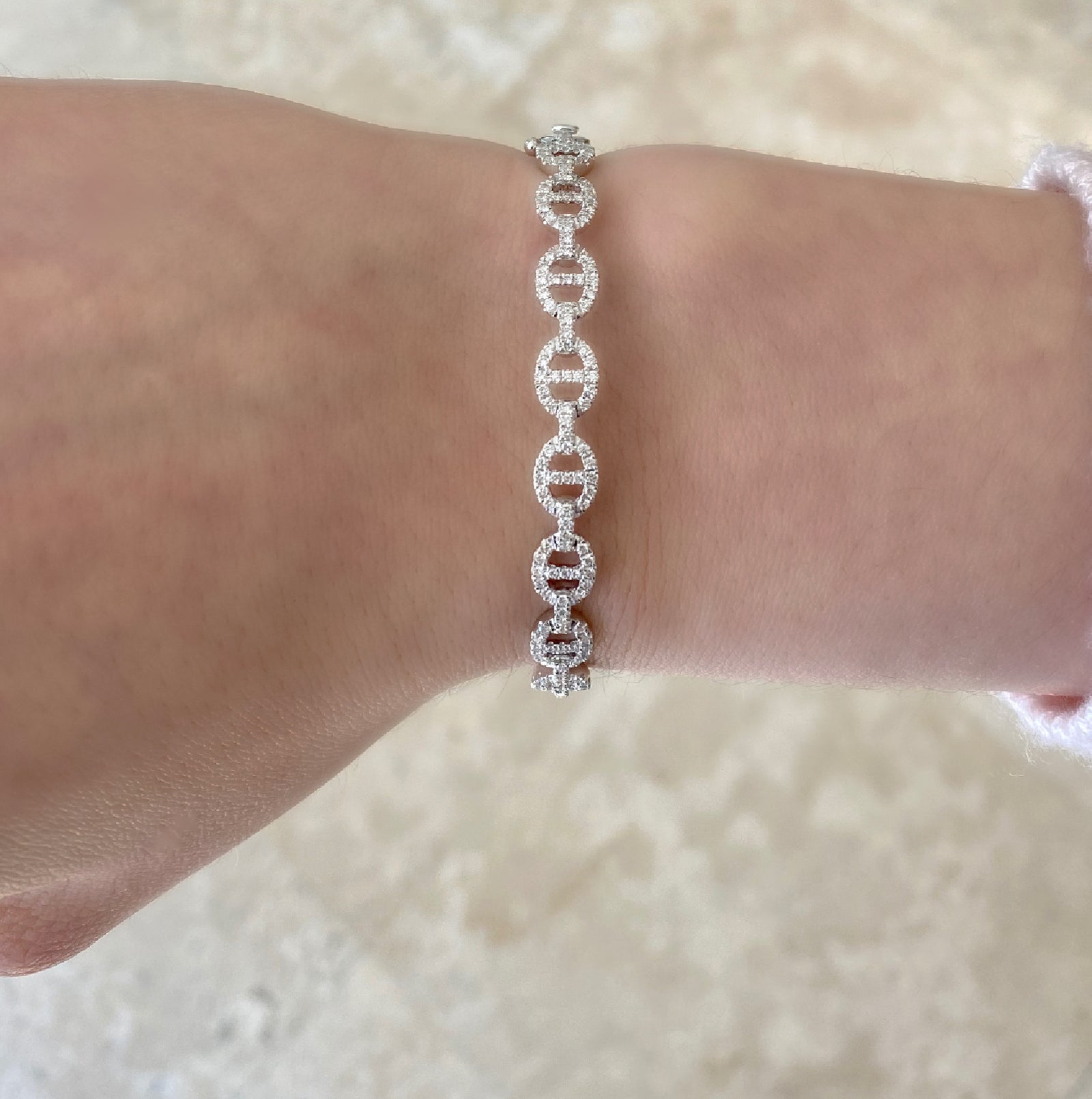 Diamond Tri-Link Bangle Bracelet -18K white gold weighing 13.08 grams -140 round diamonds weighing .85 carats