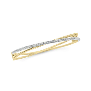 Diamond Two-Tone Crossover Bangle Bracelet -18K yellow gold weighing 16.71 grams -43 round diamonds totaling 0.77 carats