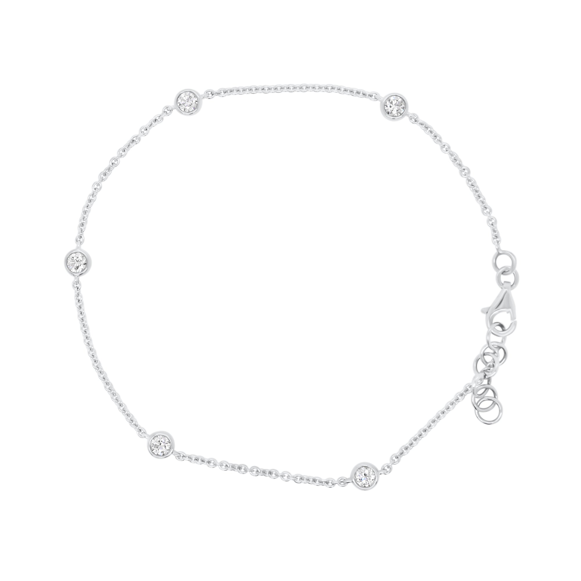 Diamonds by the Yard 5-Stone Bracelet - 18K white gold weighing 2.75 grams - 5 round diamonds totaling 0.49 carats