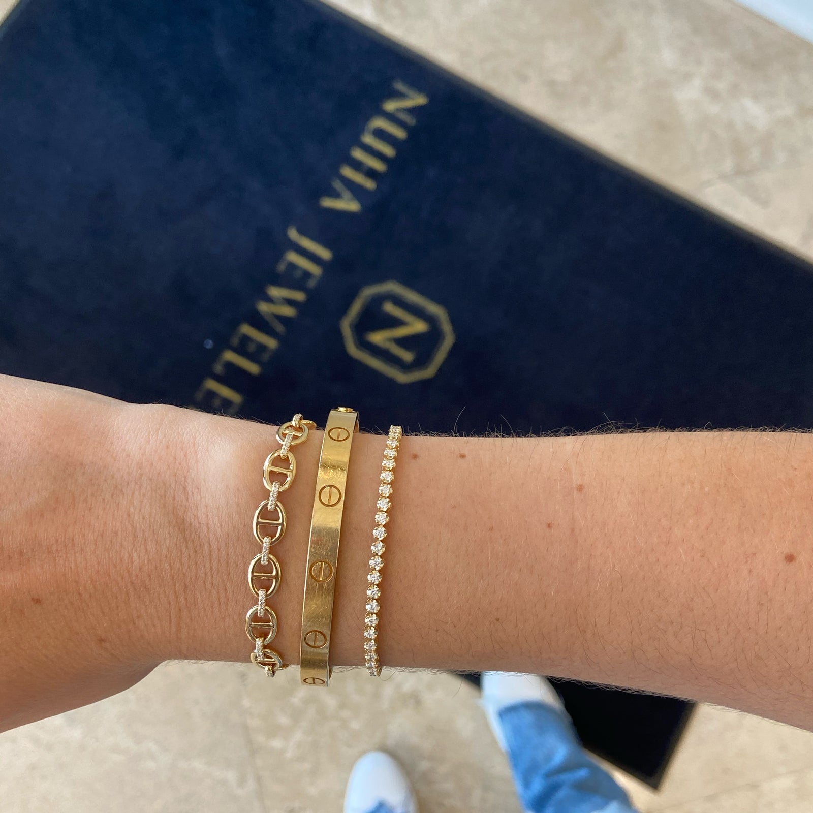 Diamond & Gold Tri-Link Bracelet - 14K yellow gold weighing 8.63 grams  - 90 round diamonds totaling 0.25 carats