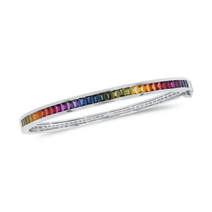Fancy Sapphire Bangle  - 18K gold weighing 15.09 grams  - 35 fancy sapphires totaling 3.51 carats