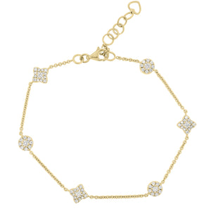 Diamond Clusters Fashion Bracelet - 18K yellow gold weighing 3.67 grams - 66 round diamonds totaling 0.56 carats