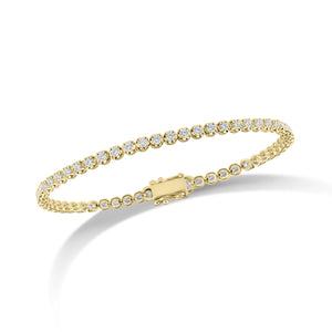 Diamond Slim Classic Tennis Bracelet  - 14K gold weighing 6.46 grams  - 61 round diamonds totaling 1.53 carats