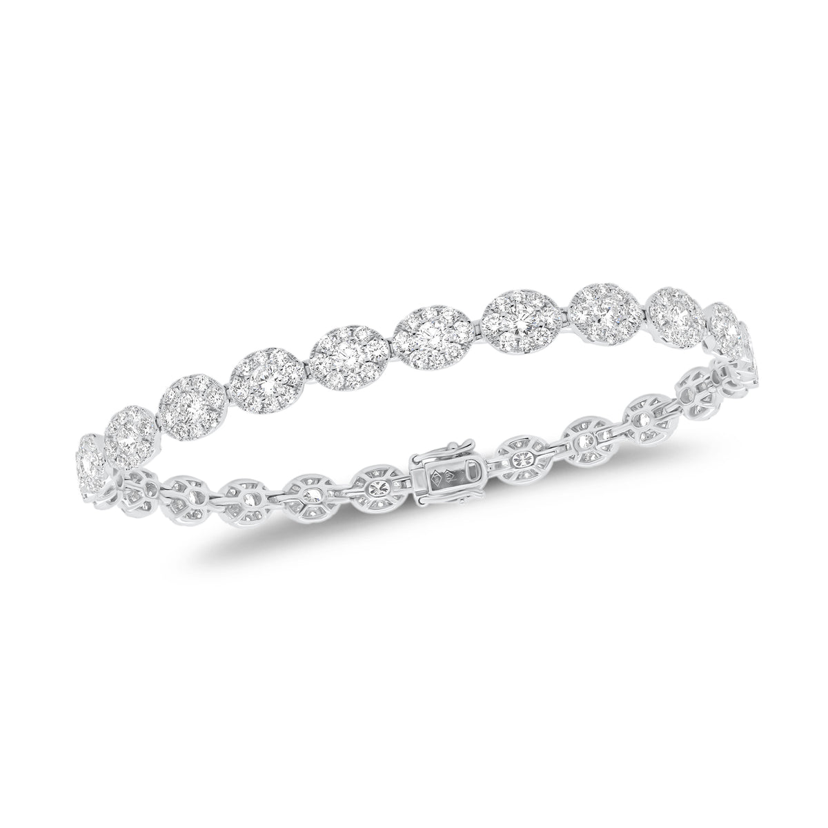 Diamond Oval Link Bracelet  - 18K gold weighing 9.81 grams  - 25 round diamonds totaling 2.18 carats  - 200 round diamonds totaling 3.43 carats