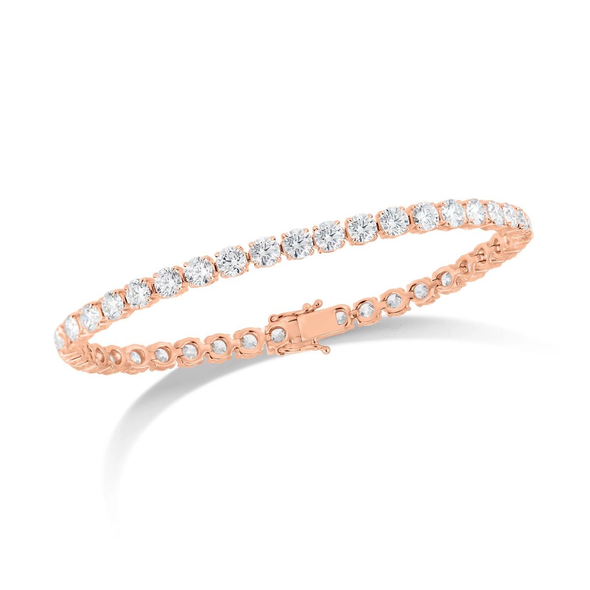 10 ct Diamond Tennis Bracelet - 18K gold weighing 14.28 grams  - 41 round diamonds totaling 10.20 carats (GIA-graded F-G color, VS2-SI1 clarity)  -152 round diamonds totaling 0.49 carats